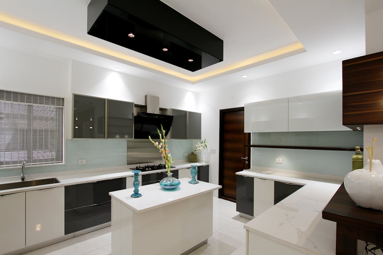 Explore a sleek and modern kitchen interior showcasing minimalist design and elegance in Hyderabad.